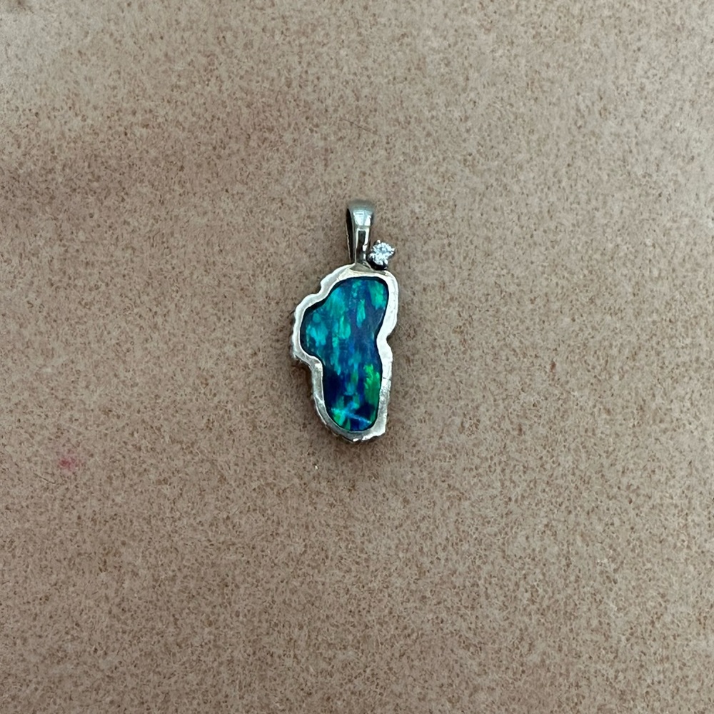 Lake Tahoe Medium Opal Sterling Silver Pendant W/ CZ.